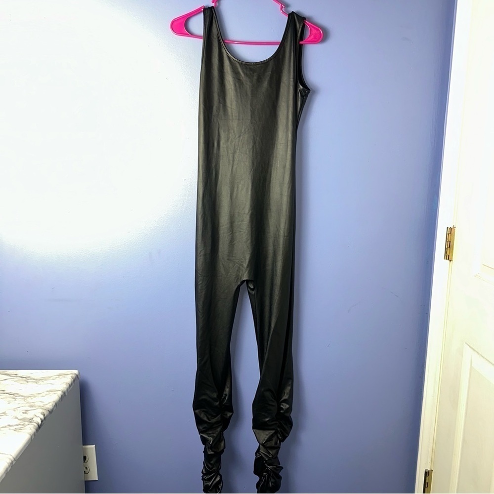 Sleeveless Faux Leather Bodycon Jumpsuit with Ruched Legs. Brand Unknown.